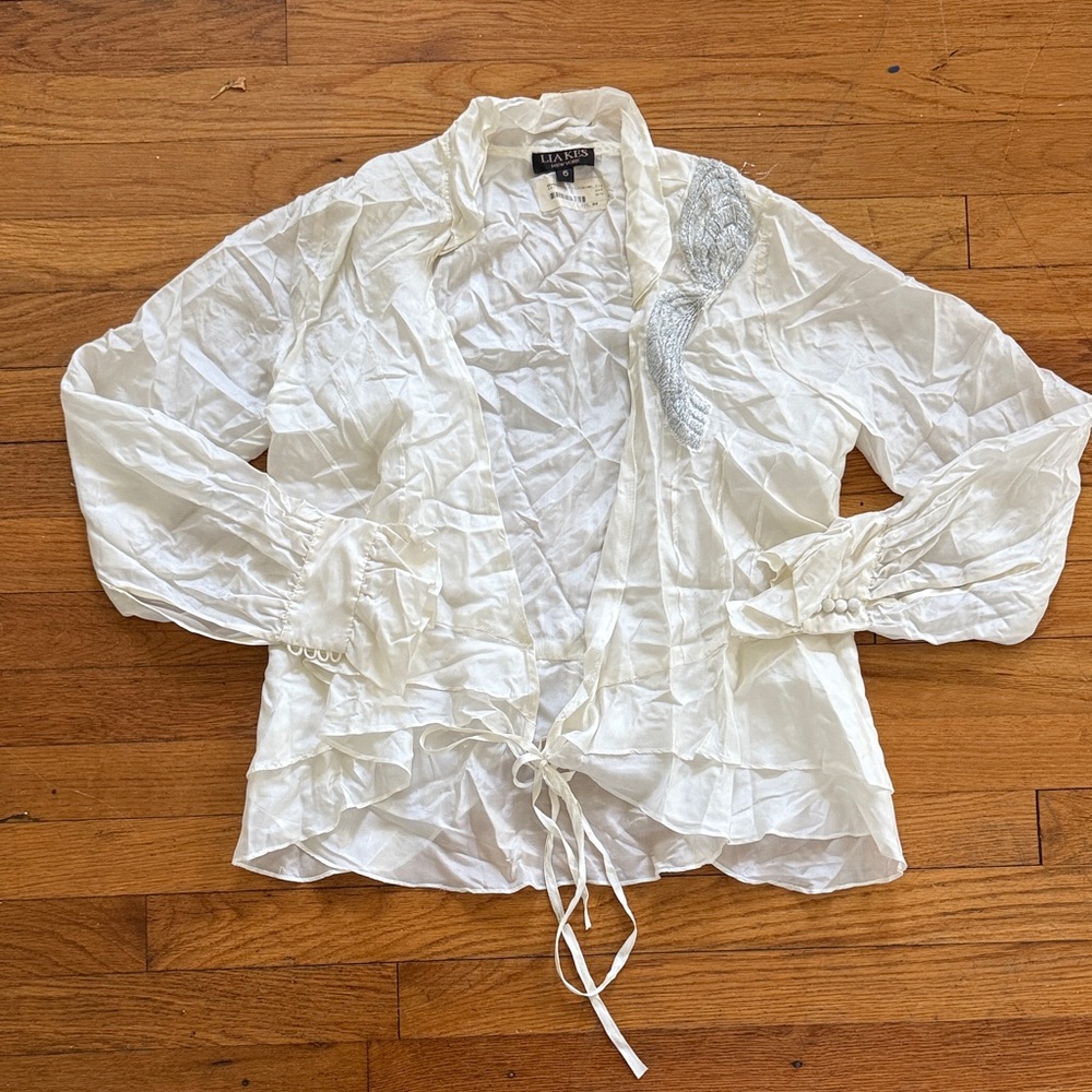 White Ruffled Blouse with Embellishment